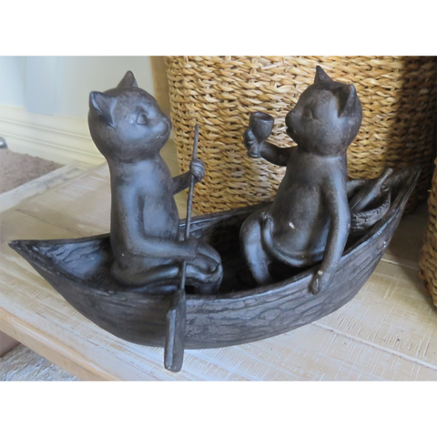 Cats Picnicking on a Boat