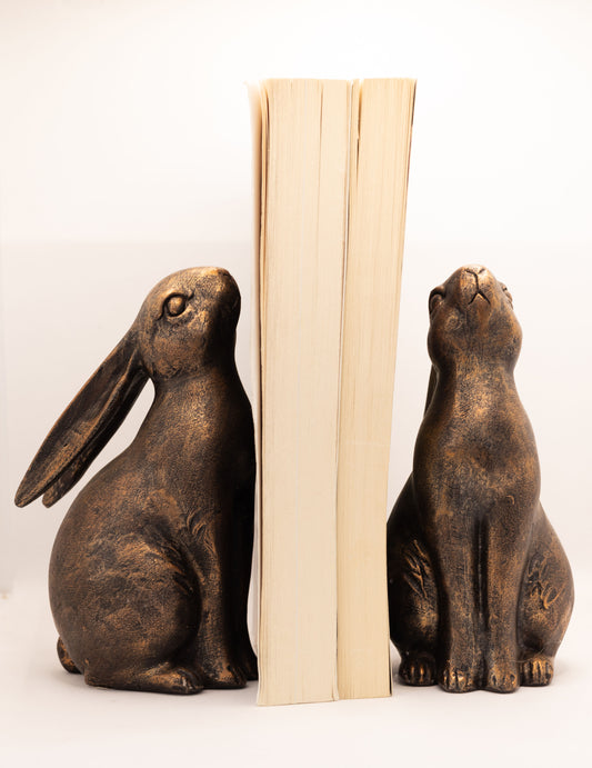 Side view of rabbit bookend showing detailed bronze resin features